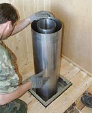 Проход трубы через потолок бани