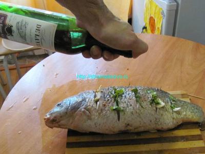  
Запечённый карп, фаршированный гречневой кашей