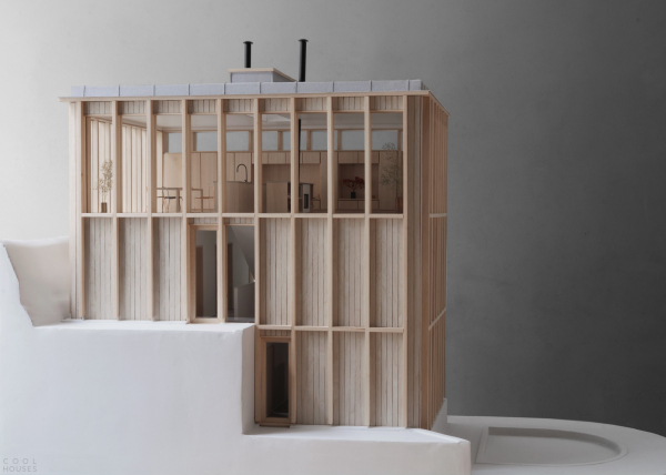 Деревянная резиденция, встроенная в скалистый склон