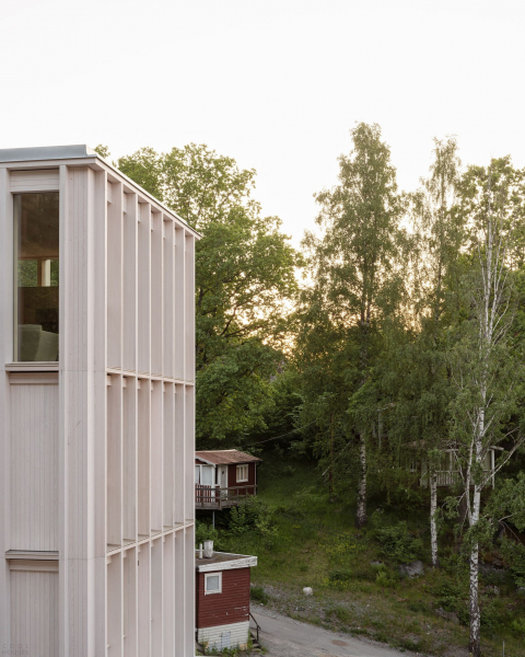 Деревянная резиденция, встроенная в скалистый склон