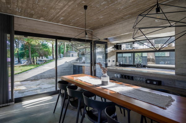 Бетонный дом в природных дюнах Бетонный дом в природных дюнах